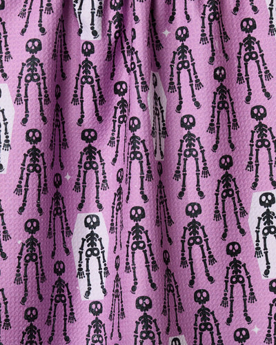 Resting Skeletons Tea Towel